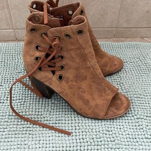 Beautiful booties. Toe out. Like new. Never worn